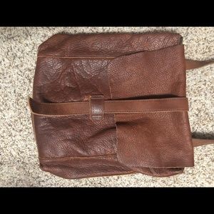 Genuine leather cross body / backpack